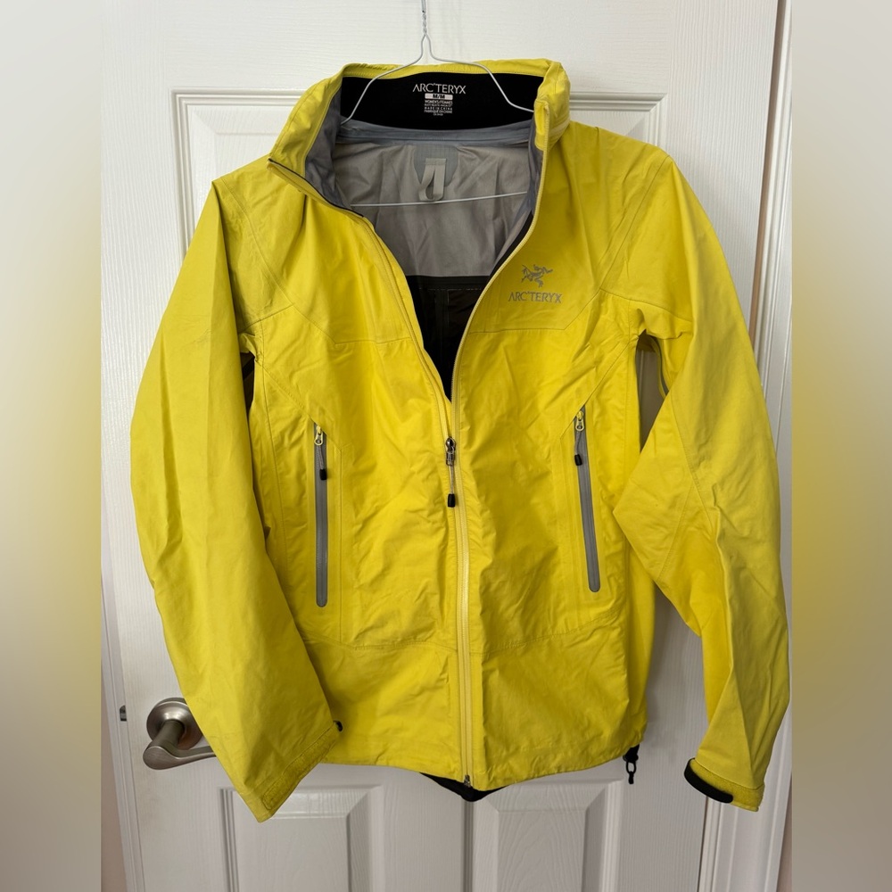 Arc’teryx Women’s size Medium waterproof jacket with hood